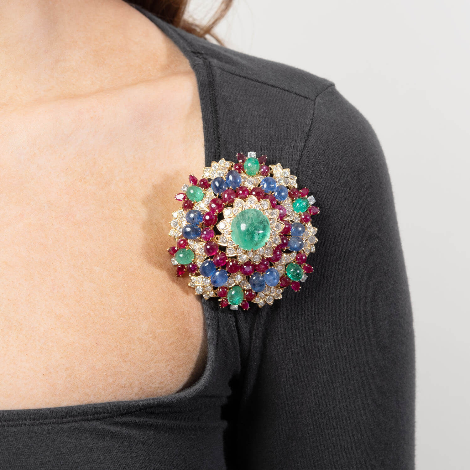 DAVID WEBB Estate 18k Emerald, Diamond, Sapphire, and Ruby Starburst Brooch
