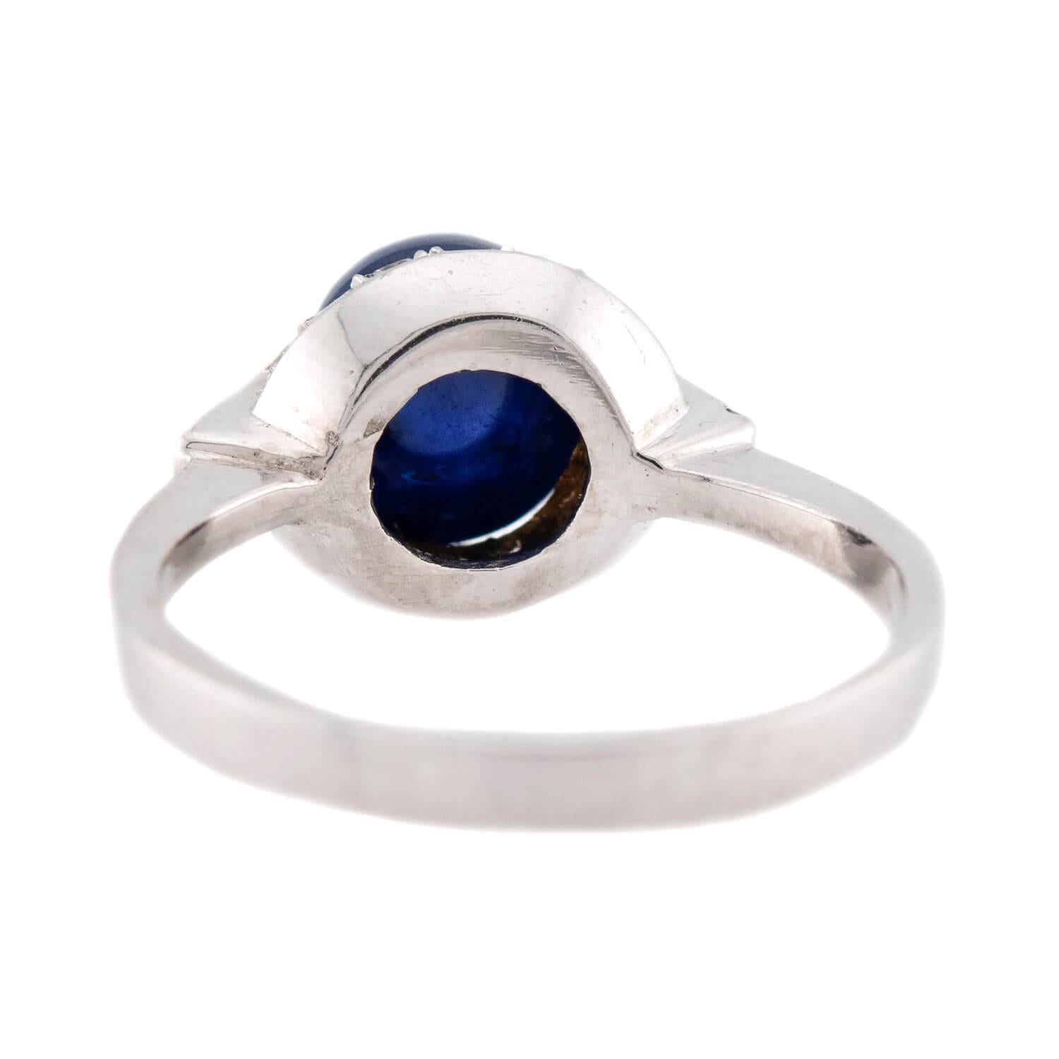 Estate Platinum Sapphire and Diamond Halo Ring