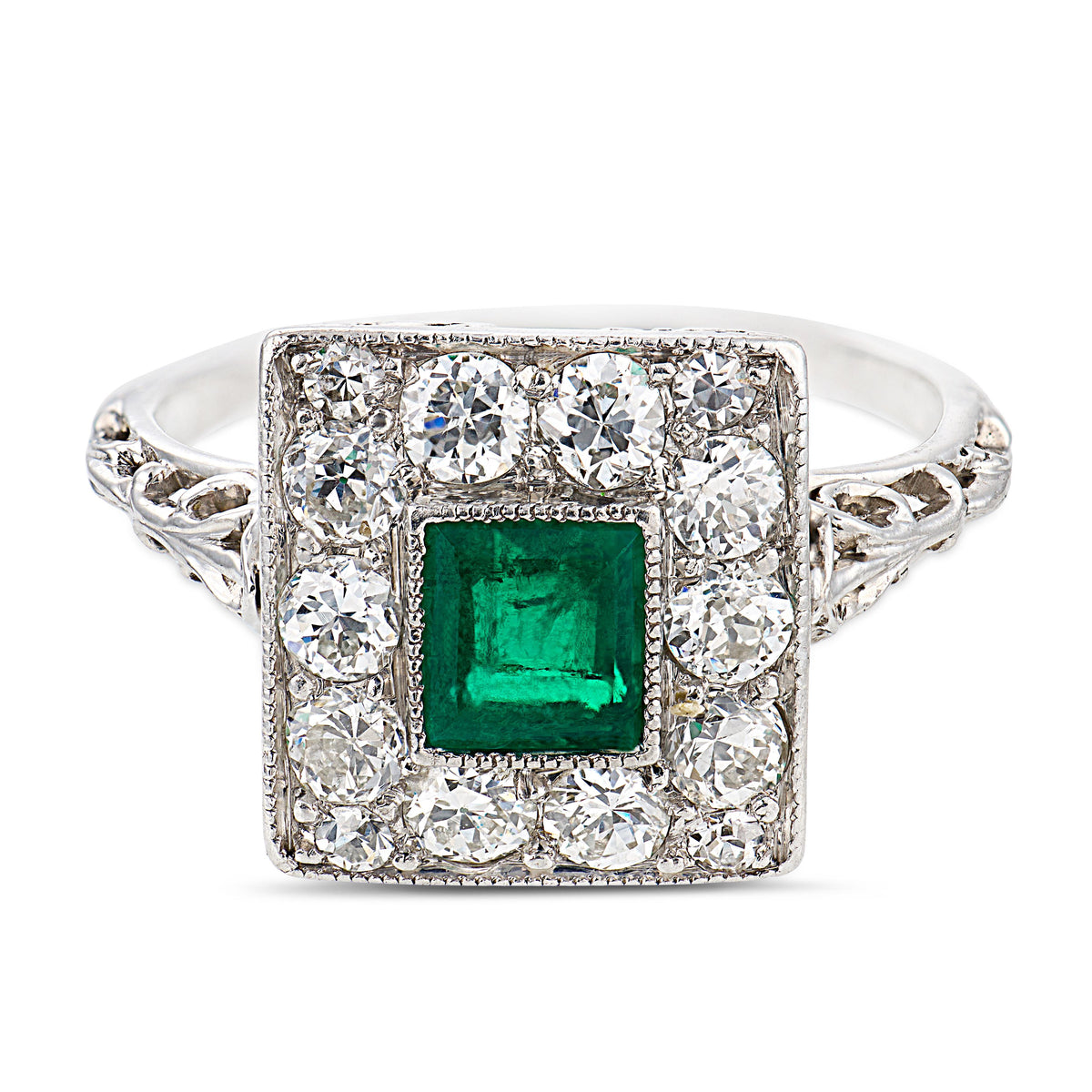 Edwardian Platinum Emerald & Diamond Halo Ring