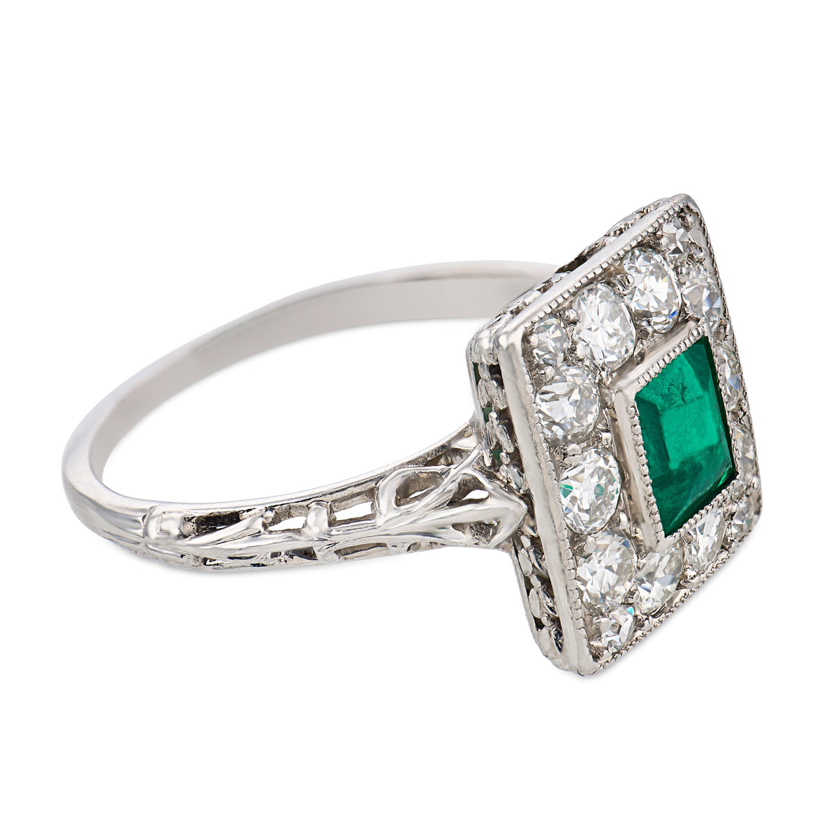 Edwardian Platinum Emerald & Diamond Halo Ring