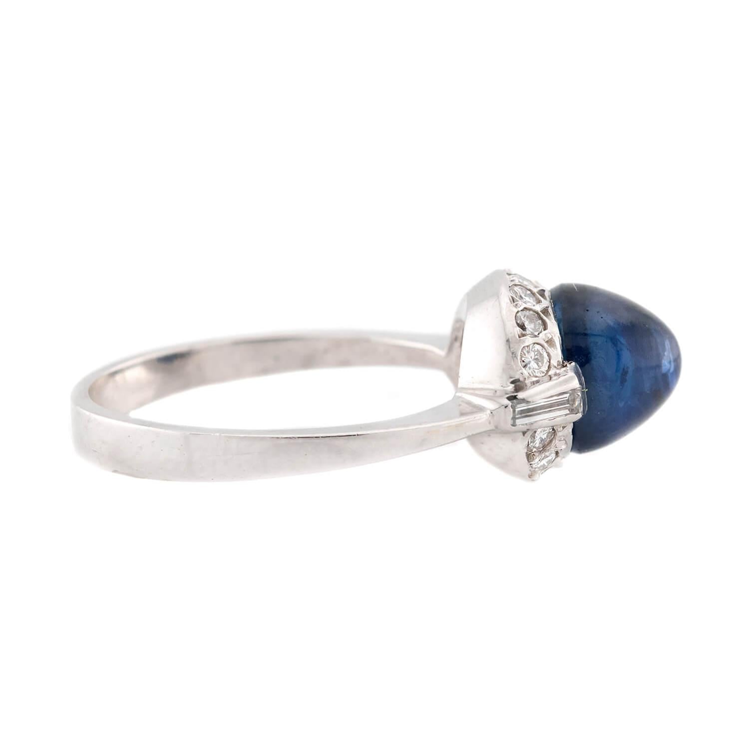 Estate Platinum Sapphire and Diamond Halo Ring