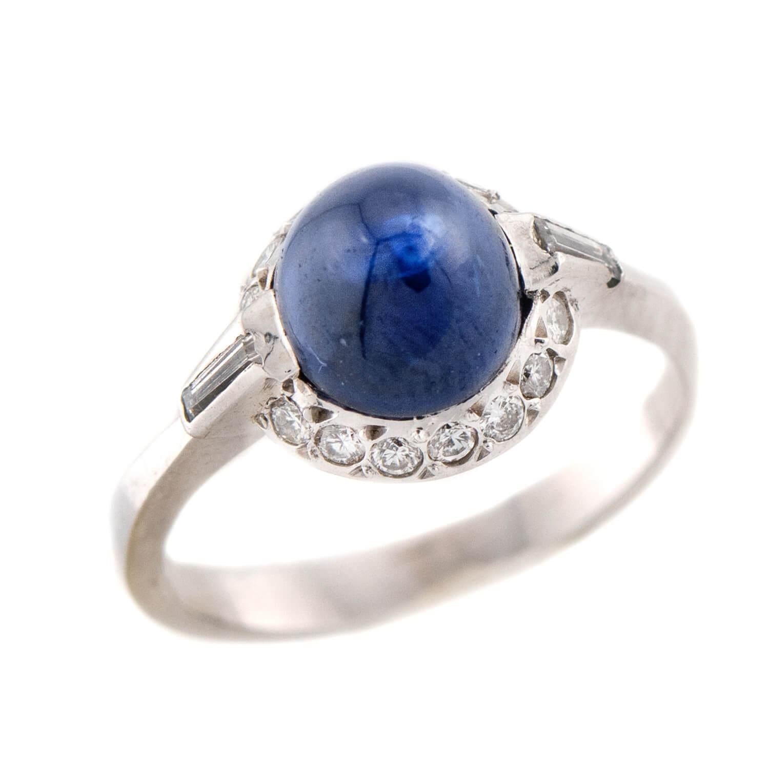 Estate Platinum Sapphire and Diamond Halo Ring