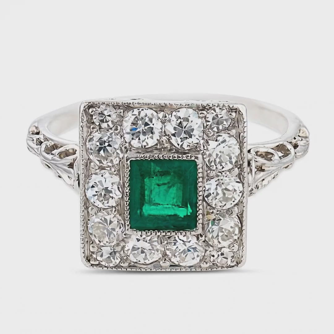Load video: Edwardian Platinum Emerald &amp; Diamond Halo Ring
